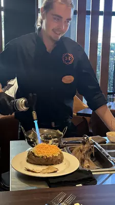 A stuffed potato with a shirt that says "but daddy I love him"