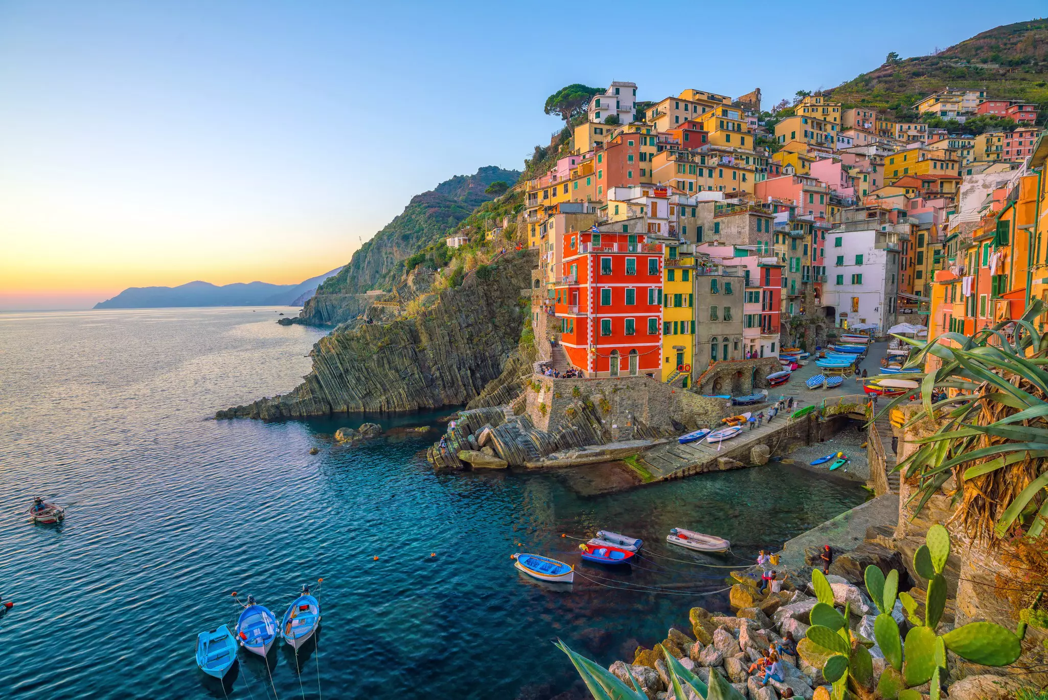 Colorful houses and harbour in Riomaggiore in Liguria, Italy