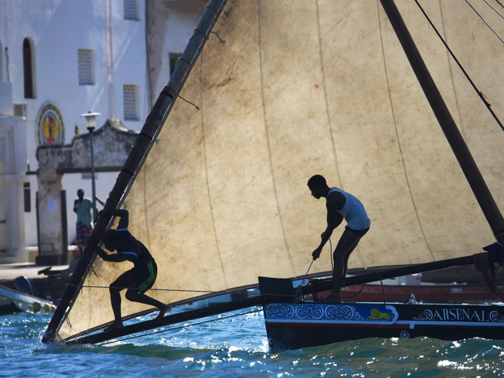 Arsenal dhow passing Lamu jetty during race at Maulidi Festival.
Lonely Planet Traveller Magazine, Issue 43
