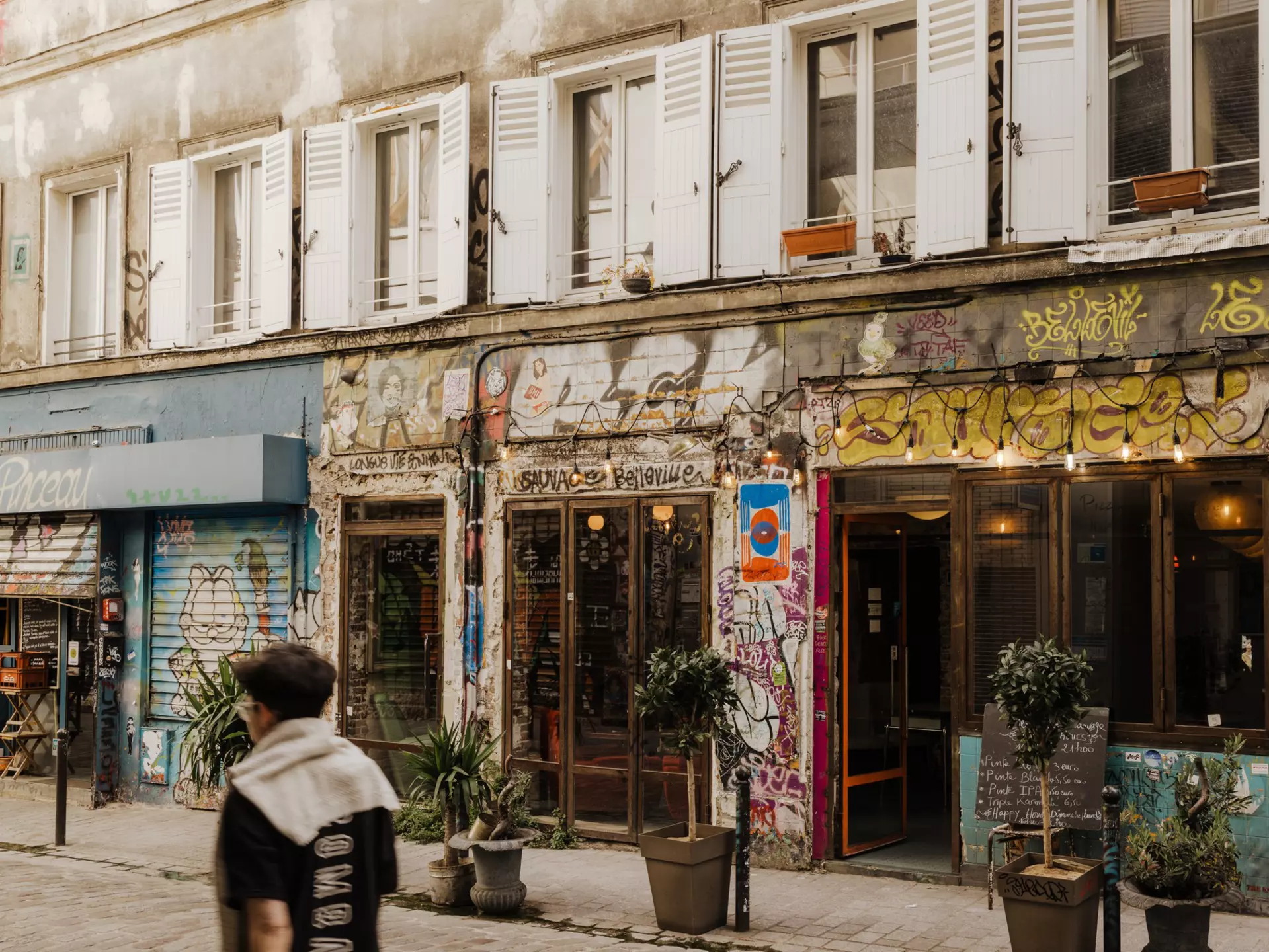 Restaurant exteriors and shopfronts decorated with street art