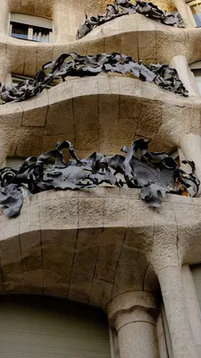A decorative wrought iron balcony railing.