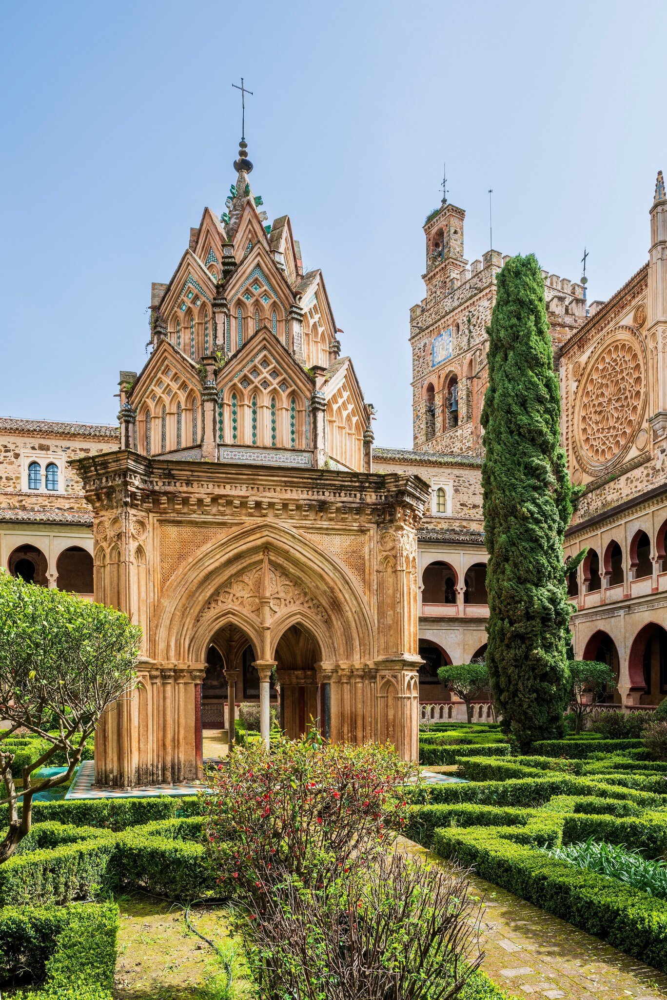 View of the inner courtyard and cloisters of the Real Monasterio de Santa María de Guadalupe in Spain.