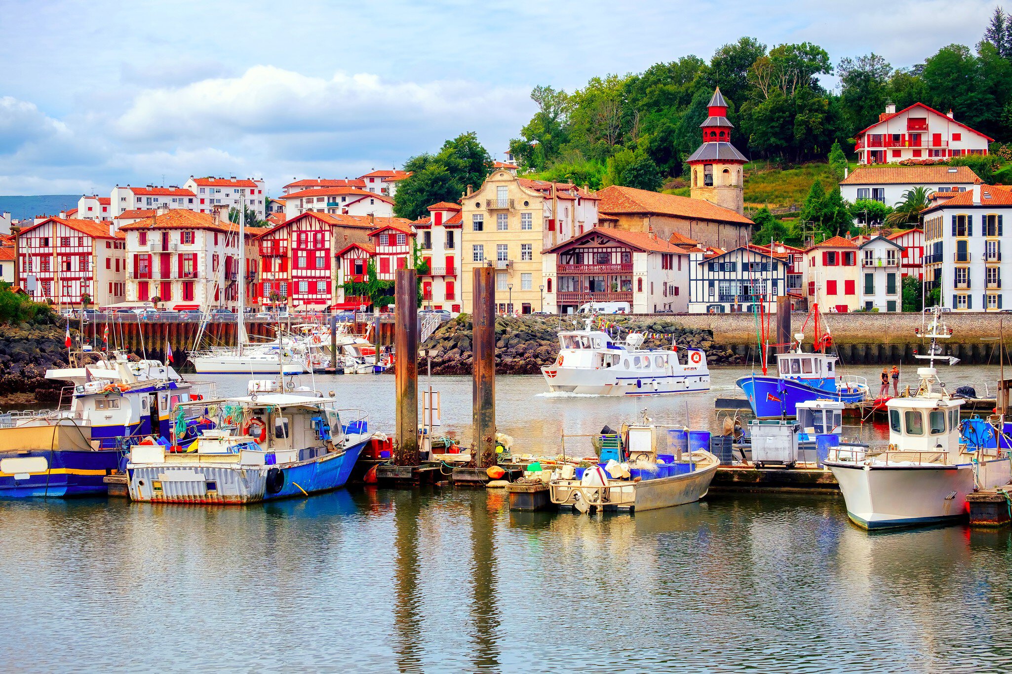 Traditional half-timbered basque houses in port of St Jean de Luz, on the atlantic coast of France