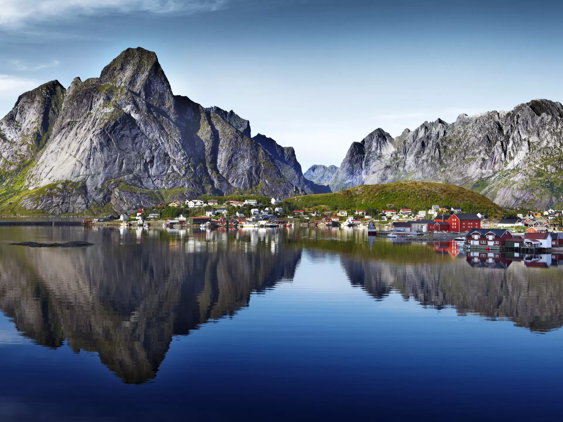 Dramatic granite peaks of Lofoten Wall and Reinebringen reflected in water beside fishing village of Reine.
Lonely Planet Traveller Magazine, Issue 14, Norway, What lies beneath