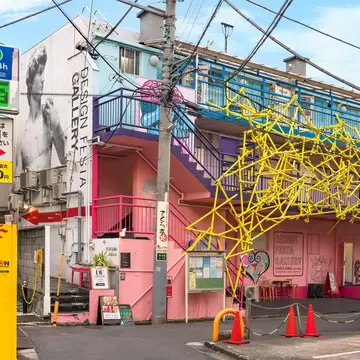 tokyo, harajuku - may 10, 2023: Colorful facade of Design Festa Gallery building dedicated to artists and decorated with an architectural metal structure and wall art illustrations of a greek apollo.  License Type: media  Download Time: 2023-11-28T15:33:05.000Z  User: nic.dhoedt_lonelyplanet  Is Editorial: Yes  purchase_order:   