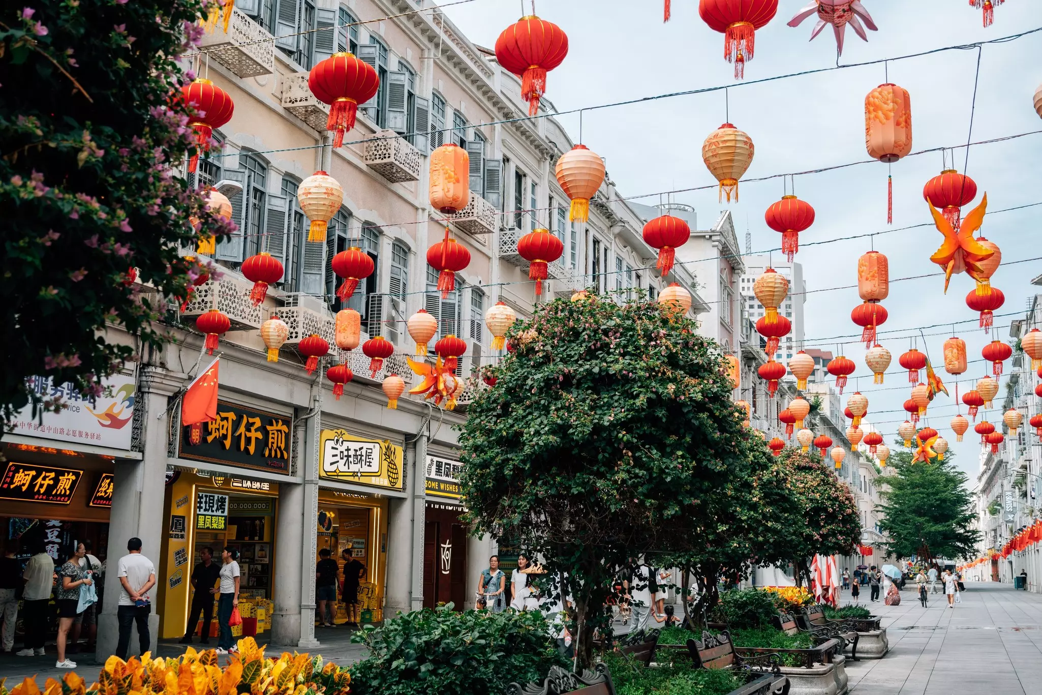 Lanterns hang over a shopping street in Xiamen, China.