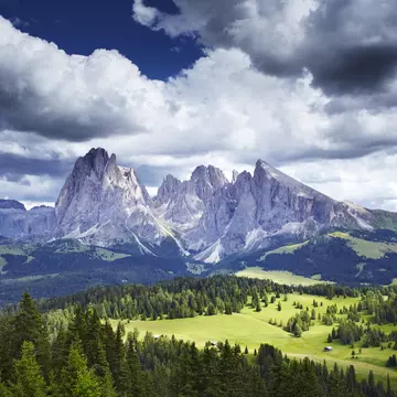 Overview of Sassolungo mountain range, seen from Alpe di Siusi cable car station.