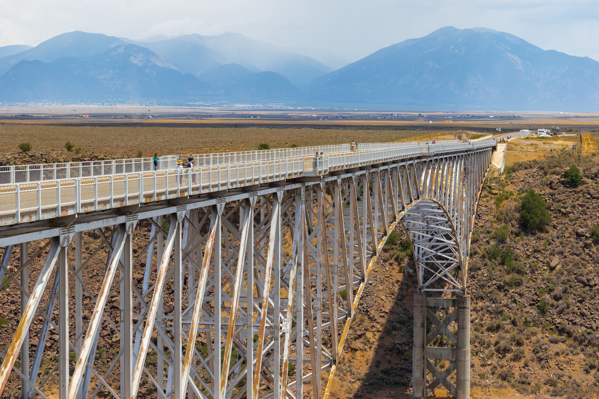 TAOS, NM, USA-6 JULY 2018:  The Rio Grande Gorge Bridge, on US 64 south of Taos is the second highest bridge in the US Highway system, and the fifth highest bridge in the country.    License Type: media  Download Time: 2022-03-07T02:56:46.000Z  User: claramonitto  Is Editorial: Yes  purchase_order:   