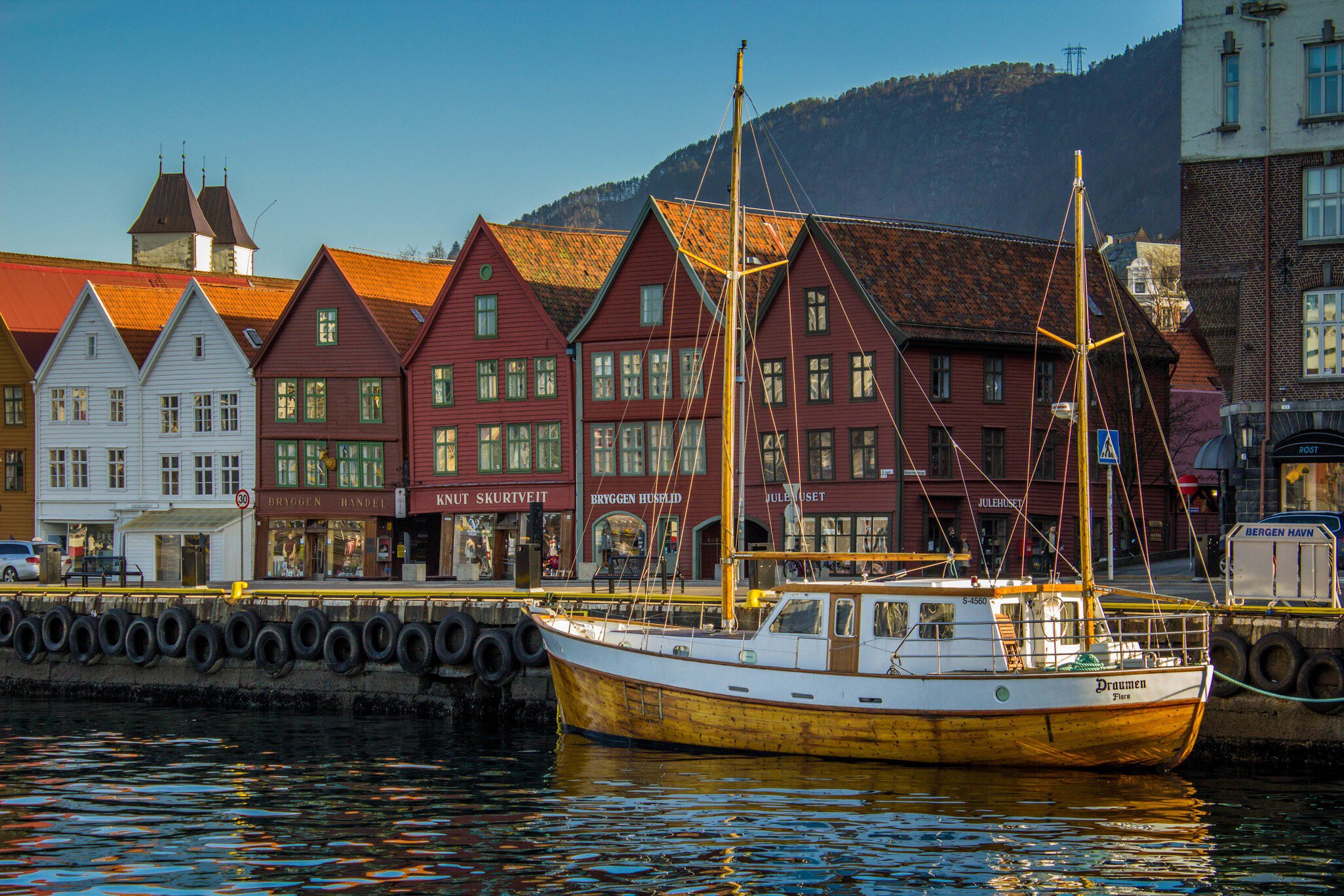 Anchored fishing boat and historic facades, Bryggen.
bergen, boat, bryggen, canon 600d, dock, norway, travel