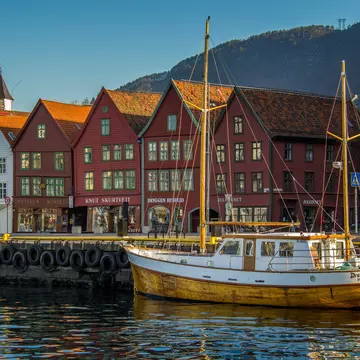 Anchored fishing boat and historic facades, Bryggen.
bergen, boat, bryggen, canon 600d, dock, norway, travel