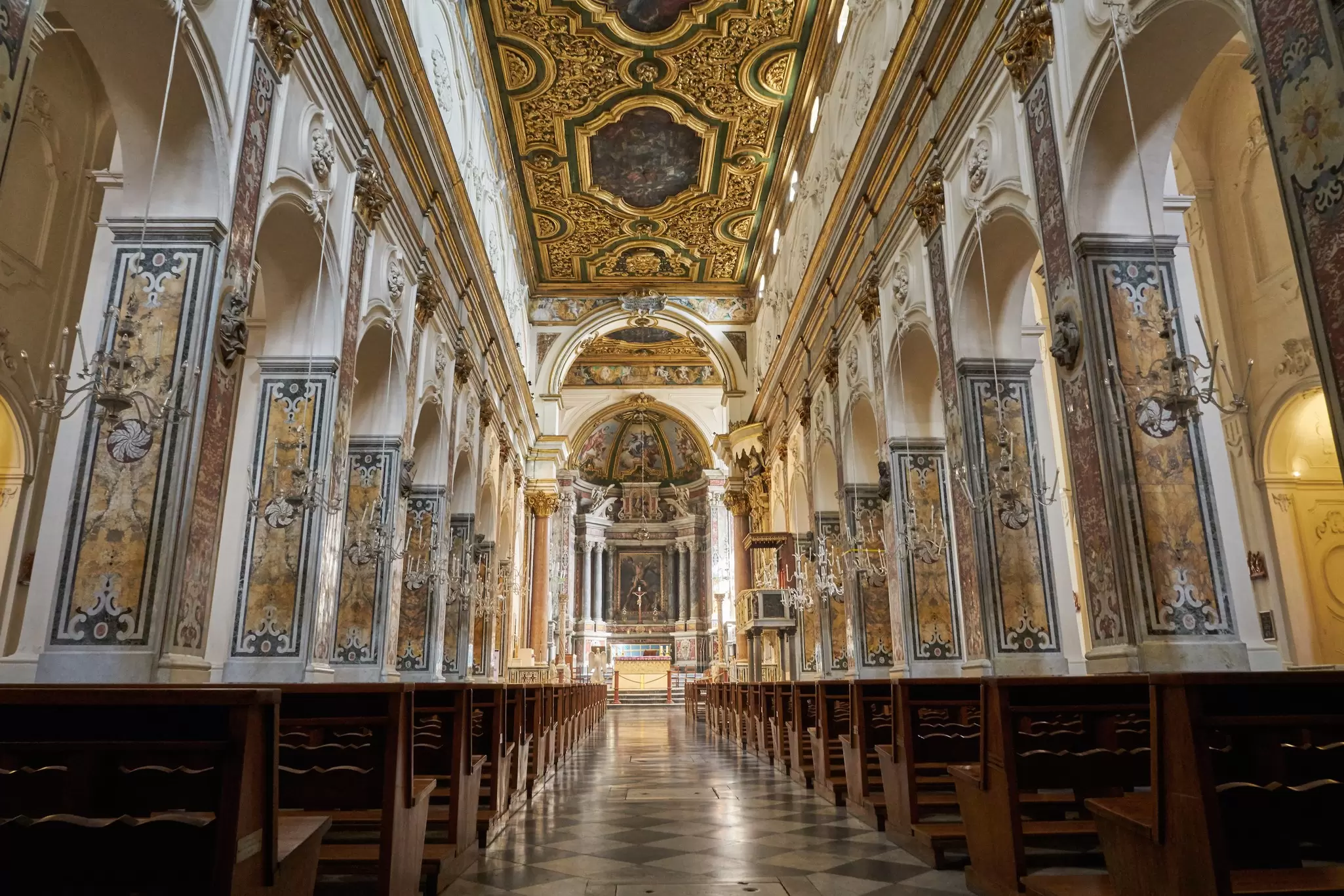 Interior view of the Duomo di Amalfi's gold-accented basilica