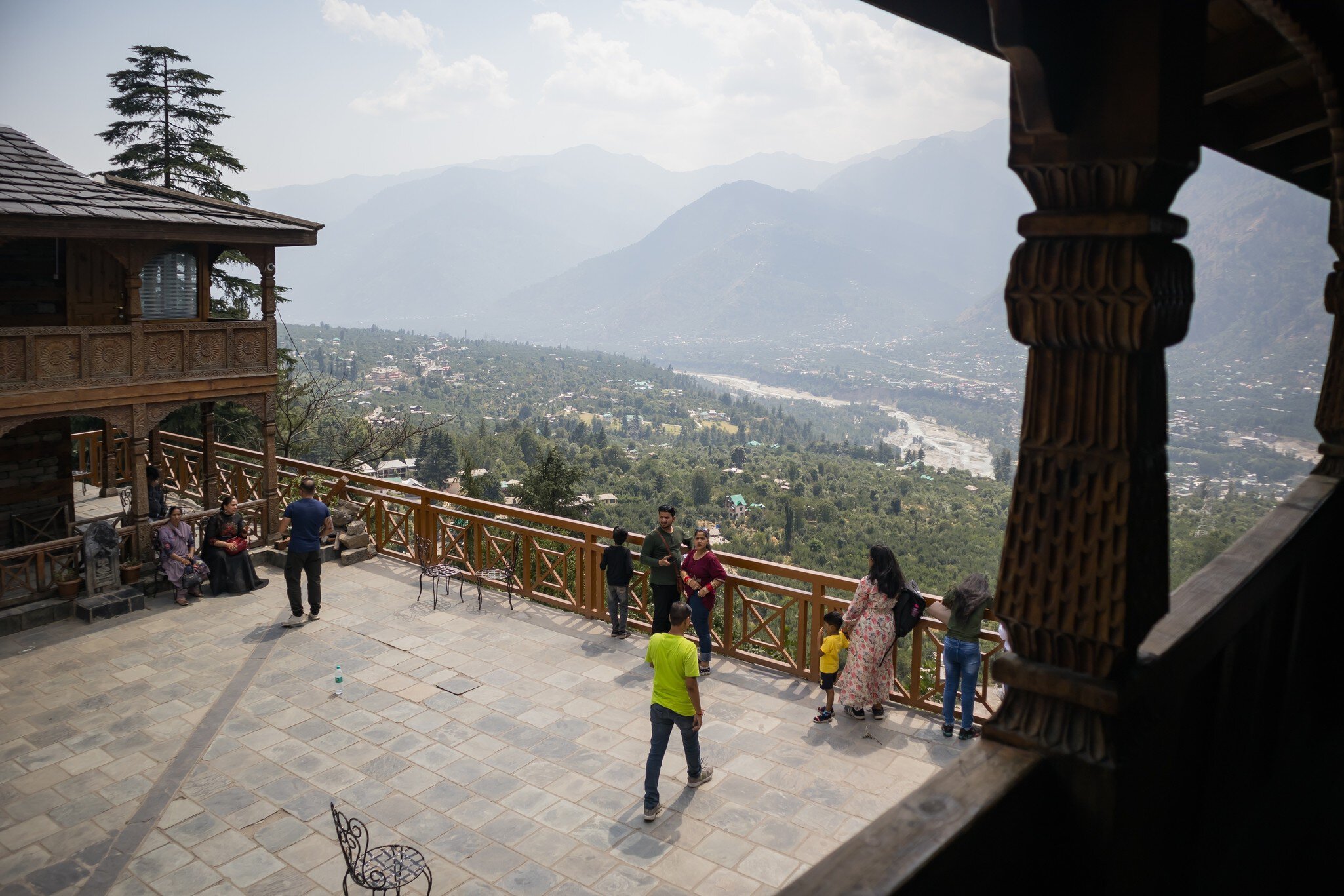 Overview of Kullu Valley from Naggar Castle in bright daylight, with Himalayan hills seen in the background. Himachal Pradesh, India.