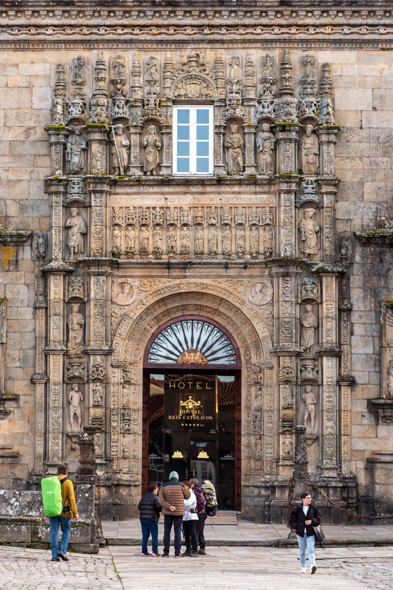 Entrance to the historic Hostal dos Reis Católicos in Santiago de Compostela, Spain.