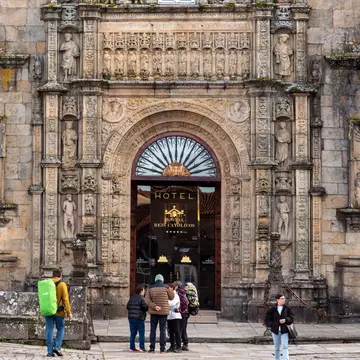 Entrance to the historic Hostal dos Reis Católicos in Santiago de Compostela, Spain.