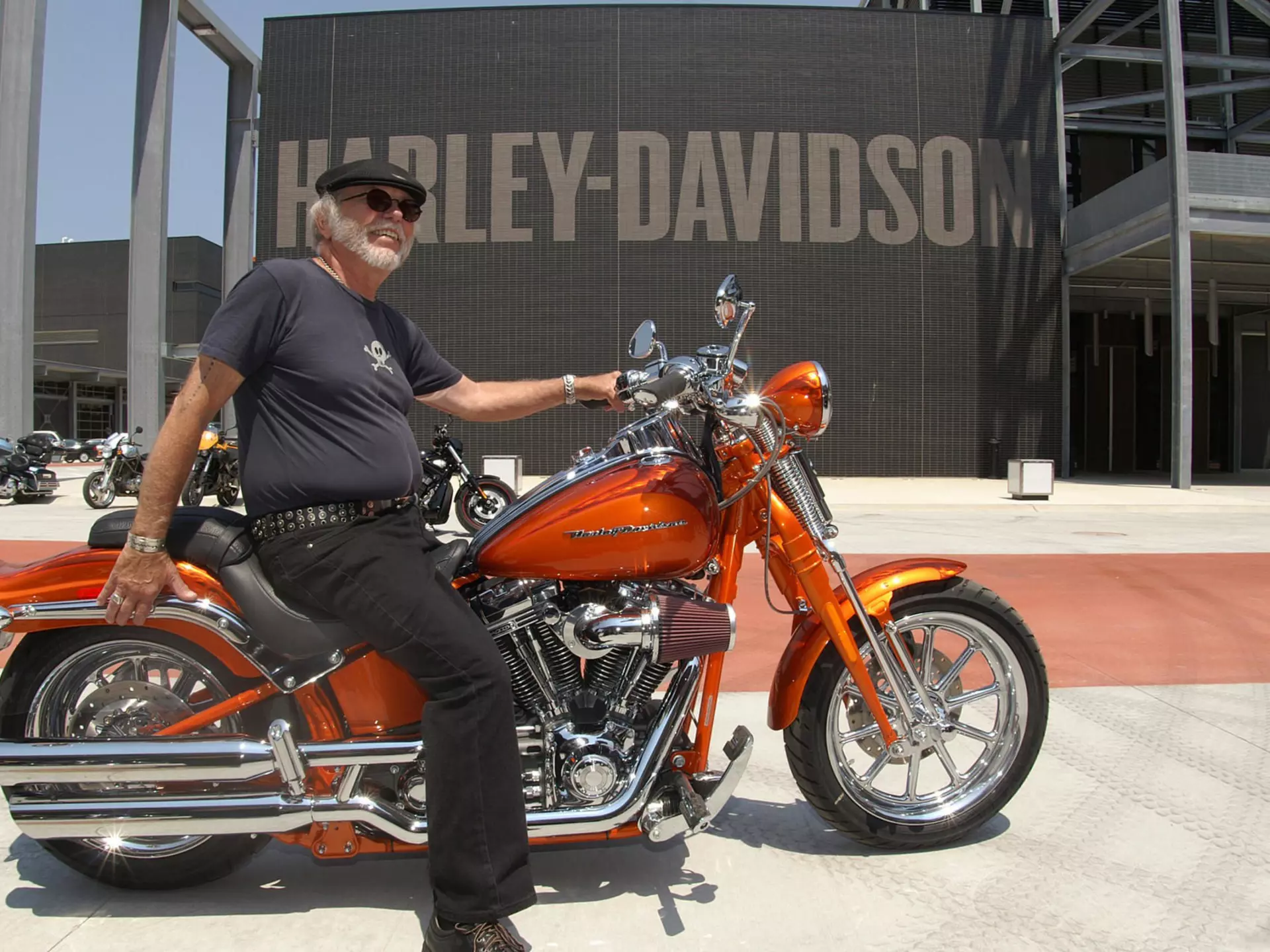 July 1, 2008: An elderly man on an orange Harley-Davidson in front of the HD museum.
1155307009
adult, america, american dream, arm, artwork, bike, biker, brand, celebration, chopper, cruiser, custom motorcycle, engine, erik tanghe, happy, harley davidson motorcycle, harley davidson museum, harley davidson president, industry, jeff decker artist, lifestyle, machine, man, military, milwaukee, motor, motorbike, motorcycle, opening, people, person, power, presentation, proud, road, show, smiling, steel, sun glasses, tattoo, the hill climber statue, transportation, v-twin, v-twin engine, vehicle, wheel, willie g. davidson, willie g. davidson's tattoo, wisconsin