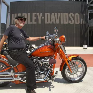 July 1, 2008: An elderly man on an orange Harley-Davidson in front of the HD museum.
1155307009
adult, america, american dream, arm, artwork, bike, biker, brand, celebration, chopper, cruiser, custom motorcycle, engine, erik tanghe, happy, harley davidson motorcycle, harley davidson museum, harley davidson president, industry, jeff decker artist, lifestyle, machine, man, military, milwaukee, motor, motorbike, motorcycle, opening, people, person, power, presentation, proud, road, show, smiling, steel, sun glasses, tattoo, the hill climber statue, transportation, v-twin, v-twin engine, vehicle, wheel, willie g. davidson, willie g. davidson's tattoo, wisconsin