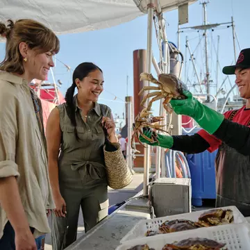 Steveston Harbor, with its riverfront boardwalks and gabled wooden storefronts, shows off the best of Richmond's dining, history and shopping scenes. Courtesy of Tourism Richmond