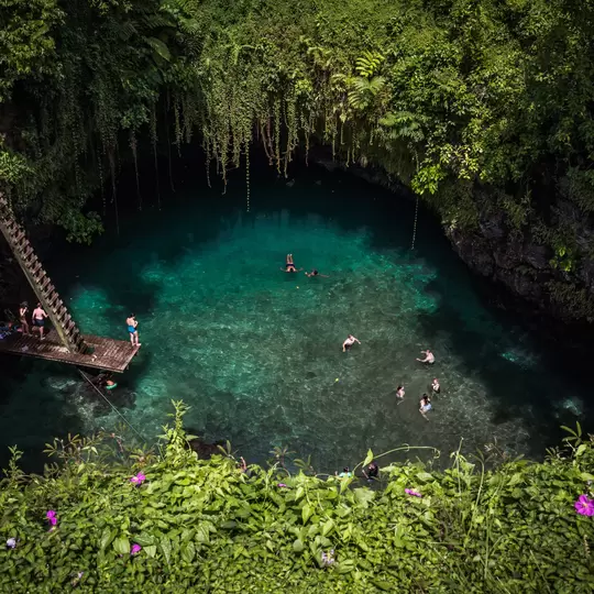 The To Sua ocean trench is a swimmer’s delight, set on the edge of a tropical paradise with the South Pacific lapping at its shores. Surrounded by lush gardens, visitors wind along cliffside paths to the natural salt water pool sunken deep into the earth.