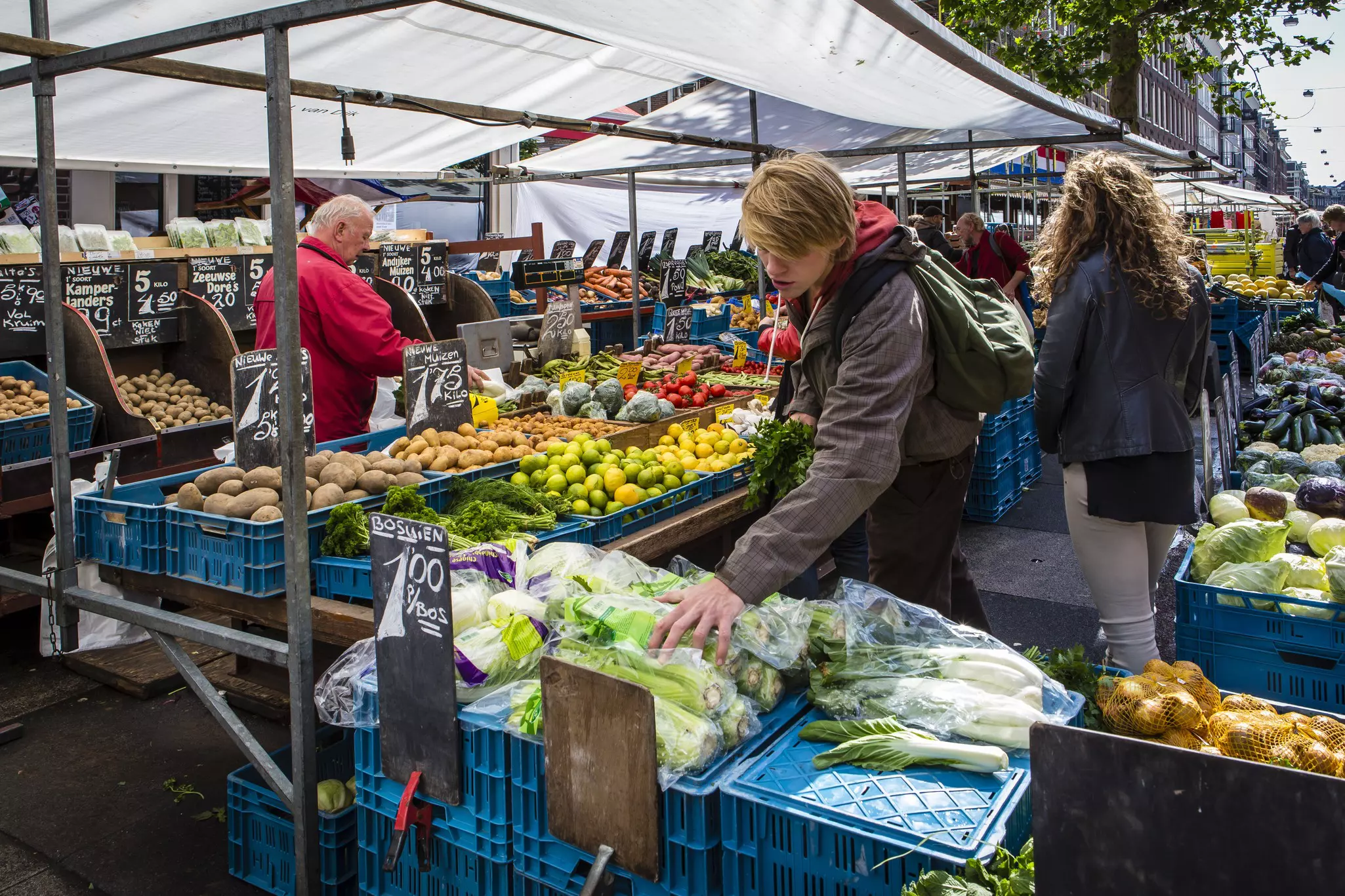 Culinarily adventurous kids can try produce, cheese and quintessential Dutch treats at the open-air Albert Cuypmarkt © Richard I'Anson / Getty Images
