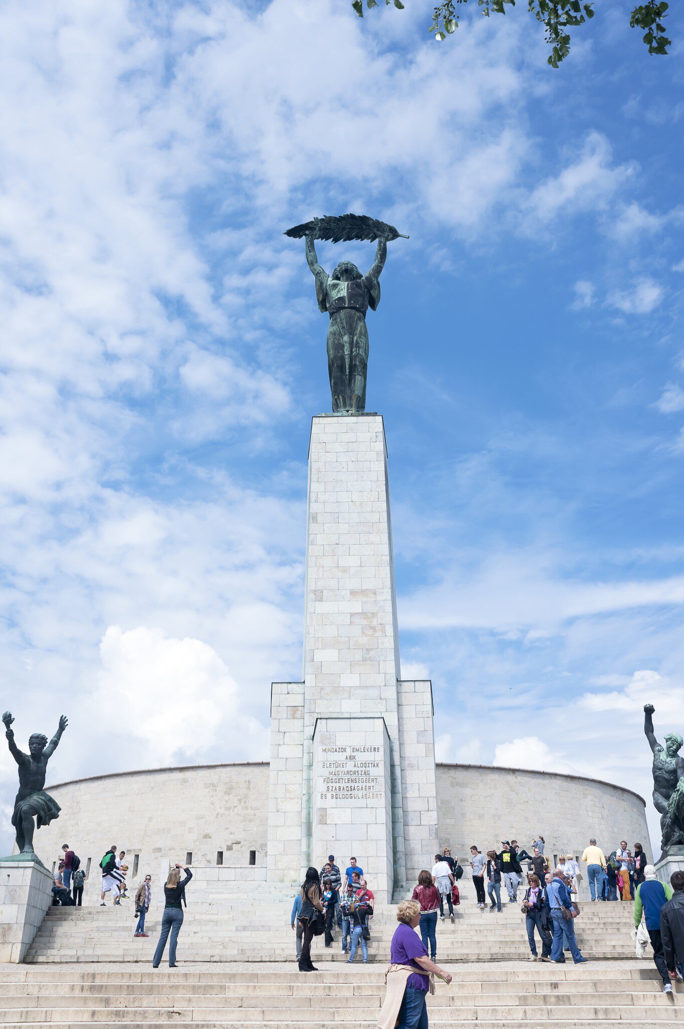 View of the Liberty Statue and Citadel located at the top of Gellért Hill in Budapest, Hungary.
