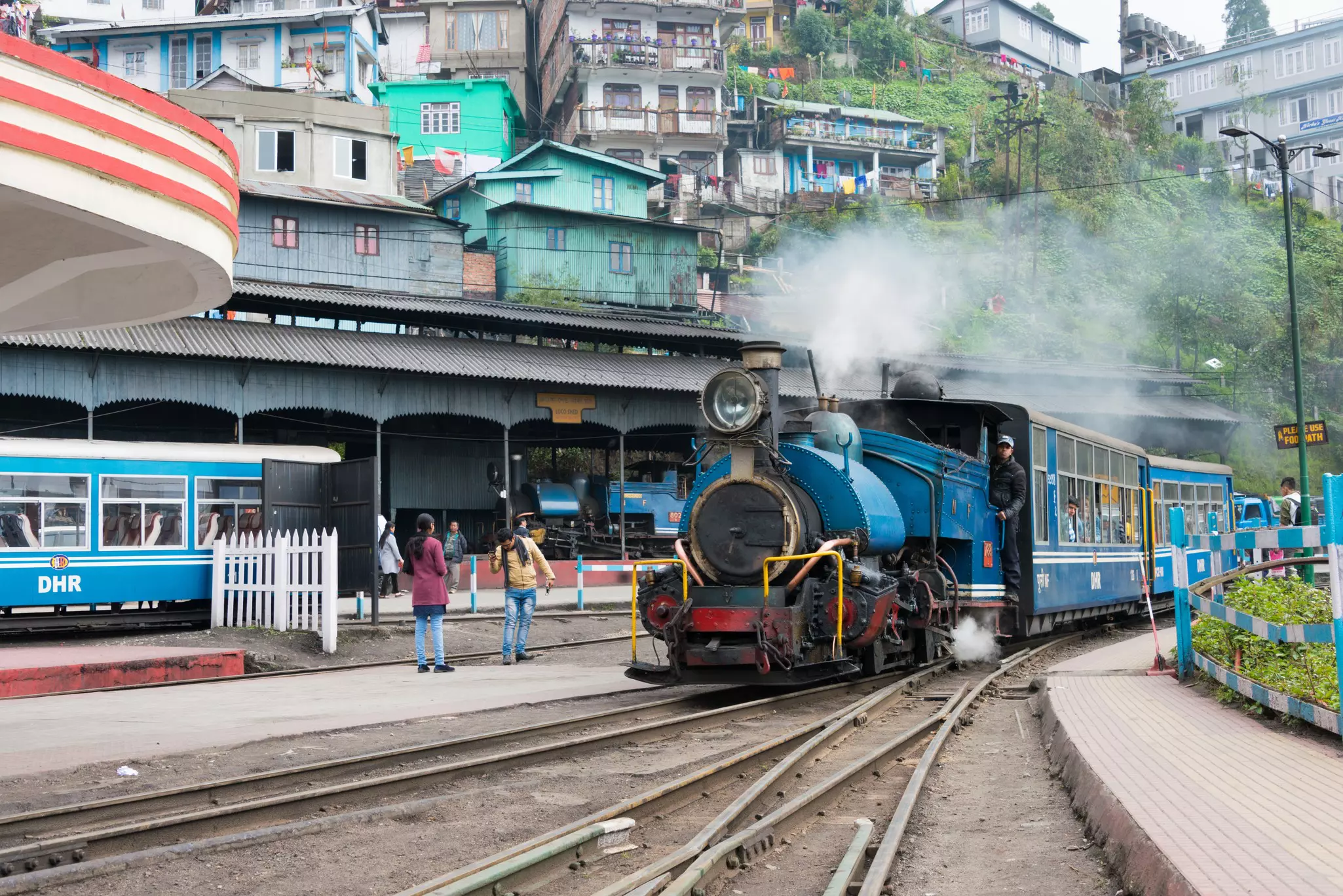 The toy train rolls into Darjeeling Railway Station
