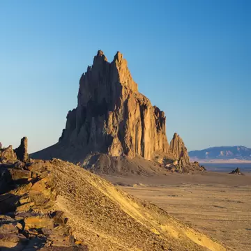 Lonely Planet Traveller Magazine, Issue 49, New Mexico, The truth is out there
2,00m peak of Shiprock rising from desert landscape.