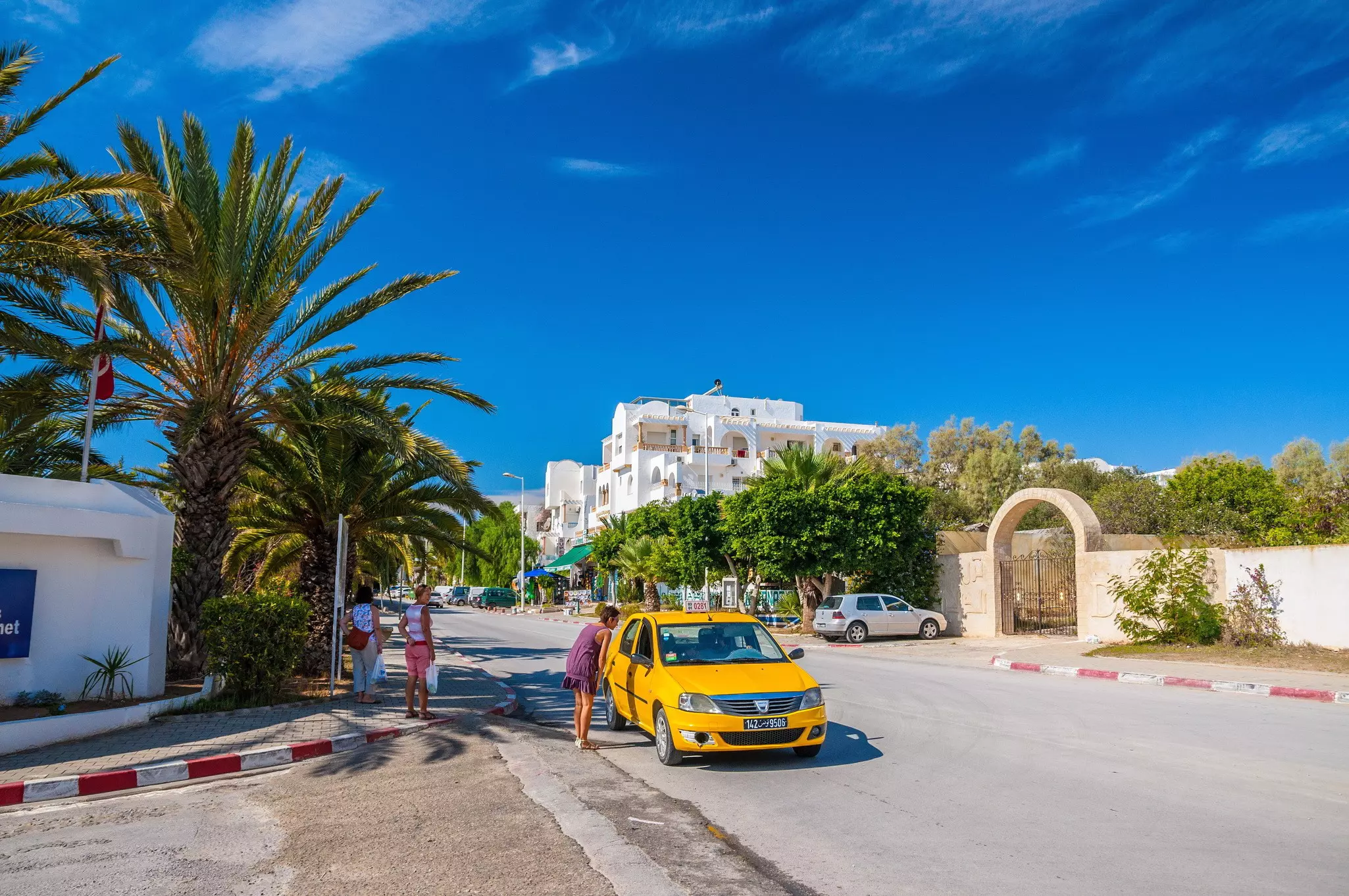 A yellow taxi on the street in Hammamet, Tunisia.