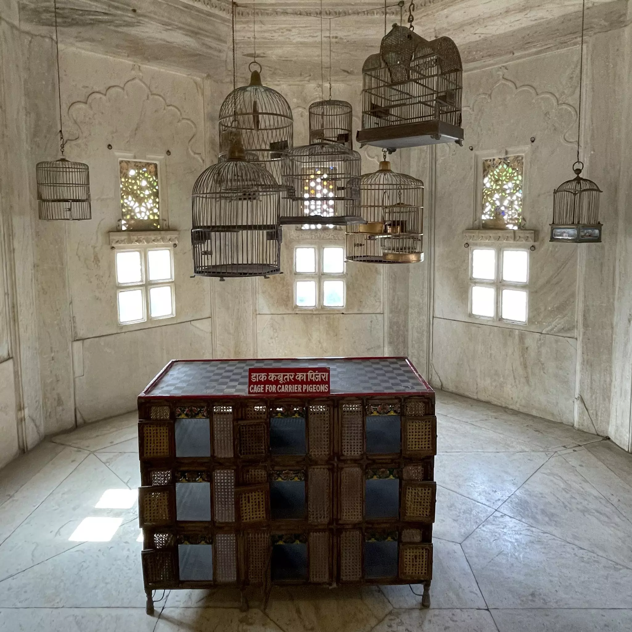 Birdcages on display in the City Palace, Udaipur, Rajasthan, India.