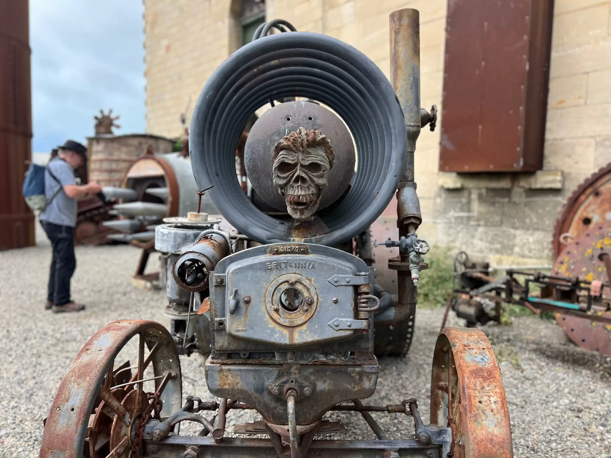 A tractor with a metal skull attached to it sits outside a museum in Oamaru’s Victorian Precinct, New Zealand