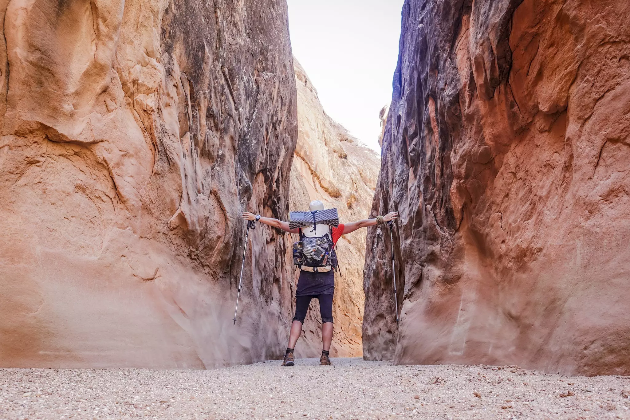 Touch the walls on the narrow canyons at Hayduke Trail in Grand Staircase-Escalante National Monument © Suzanne Stroeer/Aurora Photos/Getty Images