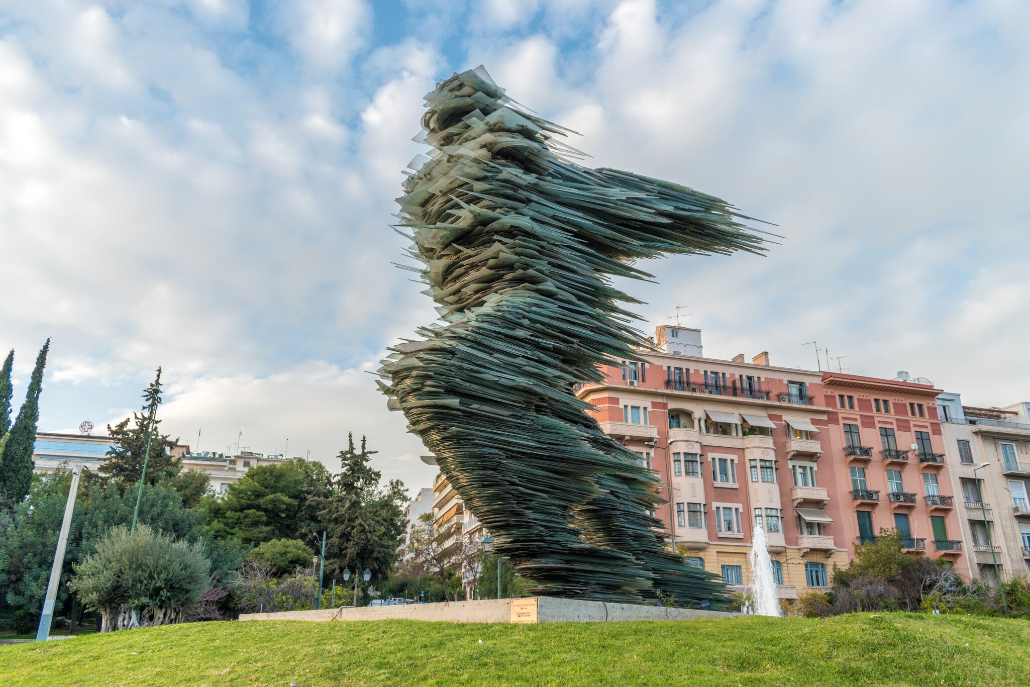 Athens, Greece - 12 March 2018: Dromeas, also known as the "The Runner", a monumental sculpture of glass stacked on iron by Costas Varotsos.; Shutterstock ID 1179520771; your: Erin Lenczycki; gl: 65050; netsuite: Digital; full: POI