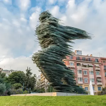 Athens, Greece - 12 March 2018: Dromeas, also known as the "The Runner", a monumental sculpture of glass stacked on iron by Costas Varotsos.; Shutterstock ID 1179520771; your: Erin Lenczycki; gl: 65050; netsuite: Digital; full: POI