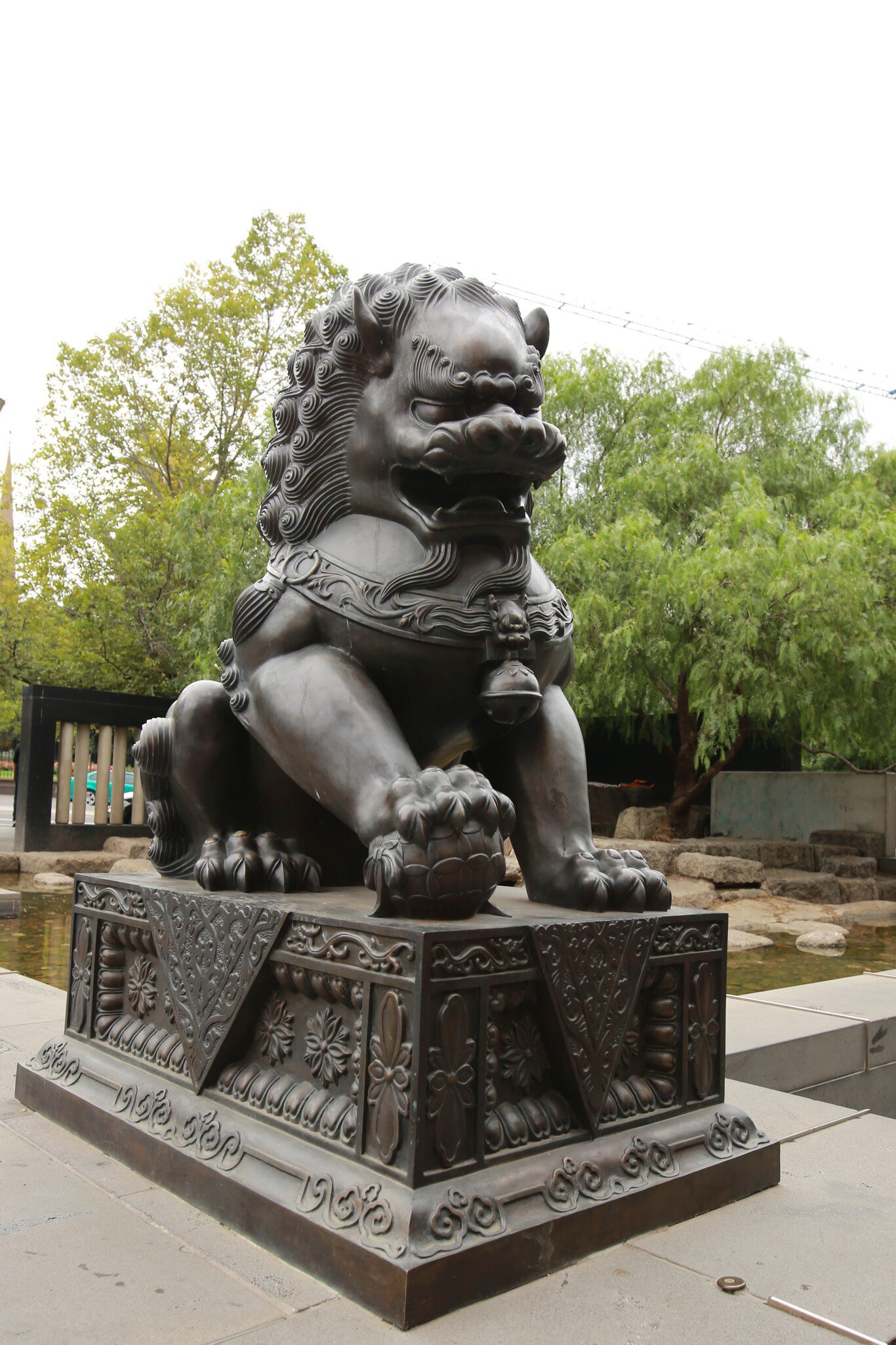 Statue in Tianjin Chinese Garden located at the northern end of Spring Street. It is a symbol of Melbourne's close friendship with its sister city, Tianjin, China. Melbourne, Australia.