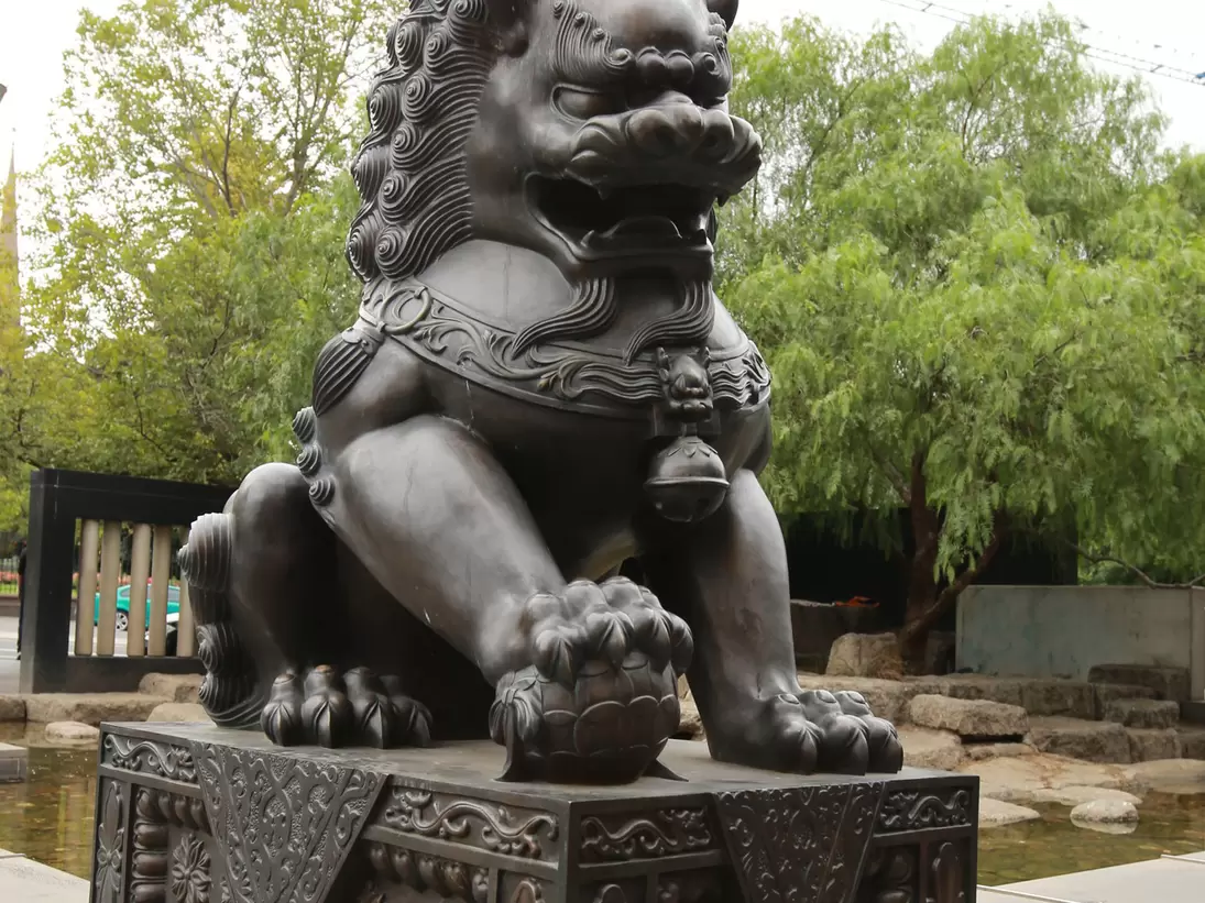 Statue in Tianjin Chinese Garden located at the northern end of Spring Street. It is a symbol of Melbourne's close friendship with its sister city, Tianjin, China. Melbourne, Australia.