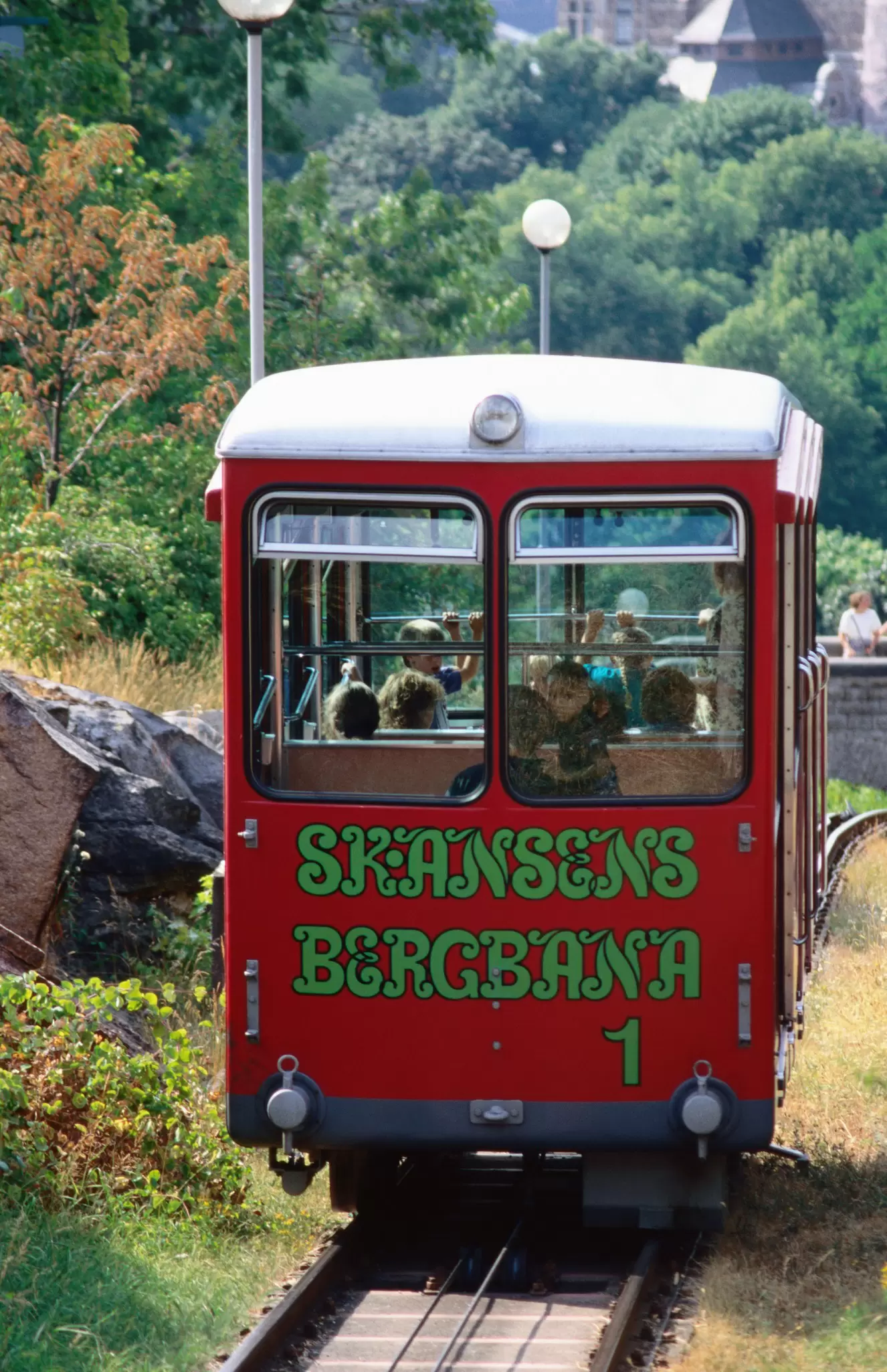 The mountain railway car takes a tour up to the hill-top of the Skansen open-air museum