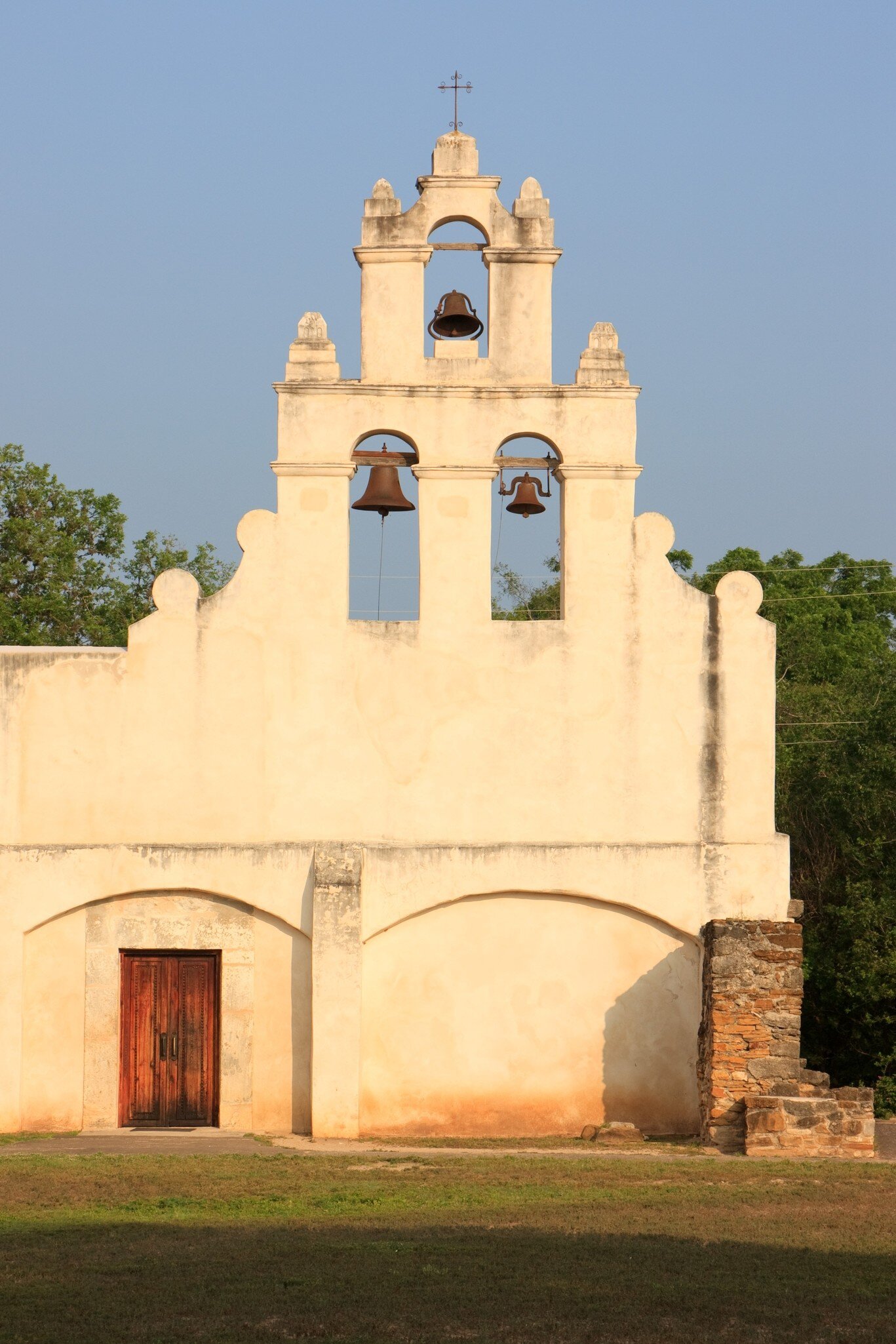 This landmark image depicts Mission San Juan Capistrano in San Antonio, Texas. This UNESCO World Heritage Site was established in 1731 by Spanish colonist along the banks of the San Antonio River.