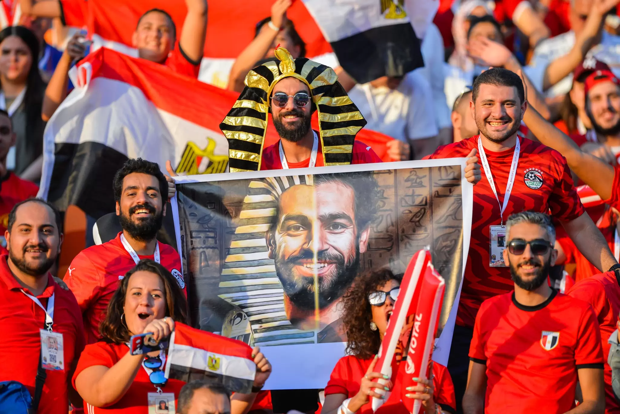 Fans of Egypt support their team ahead of the opening football match of the 2019 Africa Cup of Nations (CAN) Group A match between Egypt and Zimbabwe at the Cairo International Stadium in Cairo, License Type: media, Download Time: 2025-07-02T19:13:25.000Z, User: dermothegarty77, Editorial: true, purchase_order: 56530 - Guidebooks, job: Global Publishing WIP, client: Egypt-16, other: Dermot Hegarty