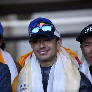 Nirmal Purja along the team member of Nepalese mountaineering team arrive and greet towards people after the first to scale Mount K2 in winter cheer as they arrive at Tribhuwan International airport in Kathmandu, Nepal, Tuesday, January 26, 2021. (Photo by Narayan Maharjan/NurPhoto via Getty Images)
1230803978
k2, mount k2, nepalese mountaineering team, nepalese mountaineering, mountaineering, k2 winter, k2 in winter, first to scale mount k2, welcome home, hero's welcome, nepal tourism, mountains, cheer, happy, moment, friends, relatives, rituals, offering, nepal pakistan, nepal-pakistan, narayan, maharjan, maharjansphotography, narayanmaharjan, maharjanarayan