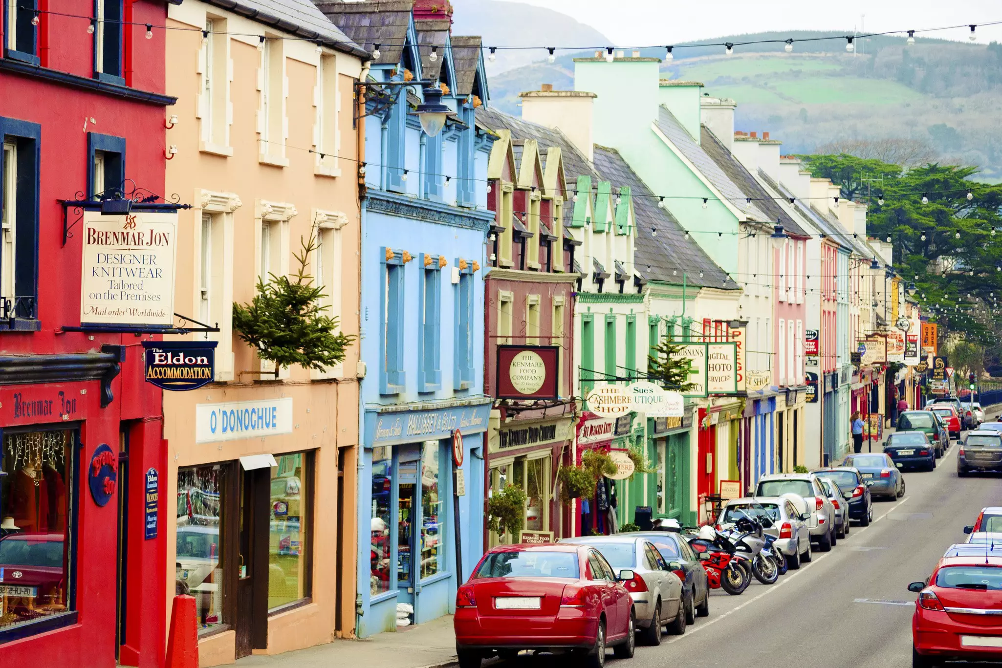 Colorful shops and restaurants along a street in Kenmare, County Kerry. 