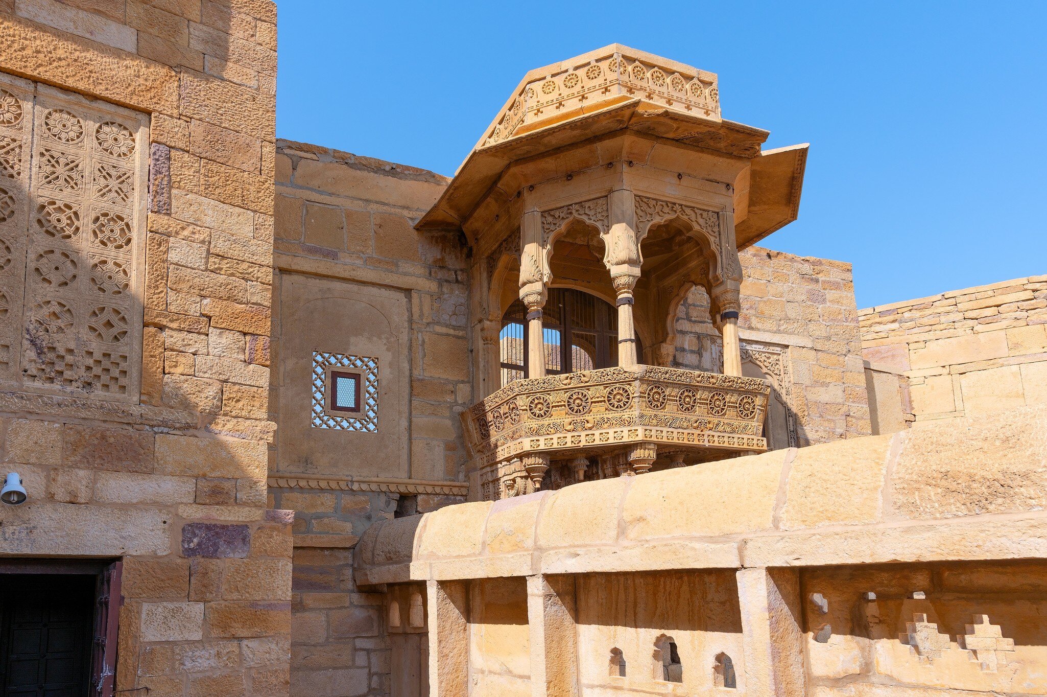 Stone window and exterior of Rani Mahal or Rani Ka Mahal, inside Jaisalmer fort. Rajasthan, India. 