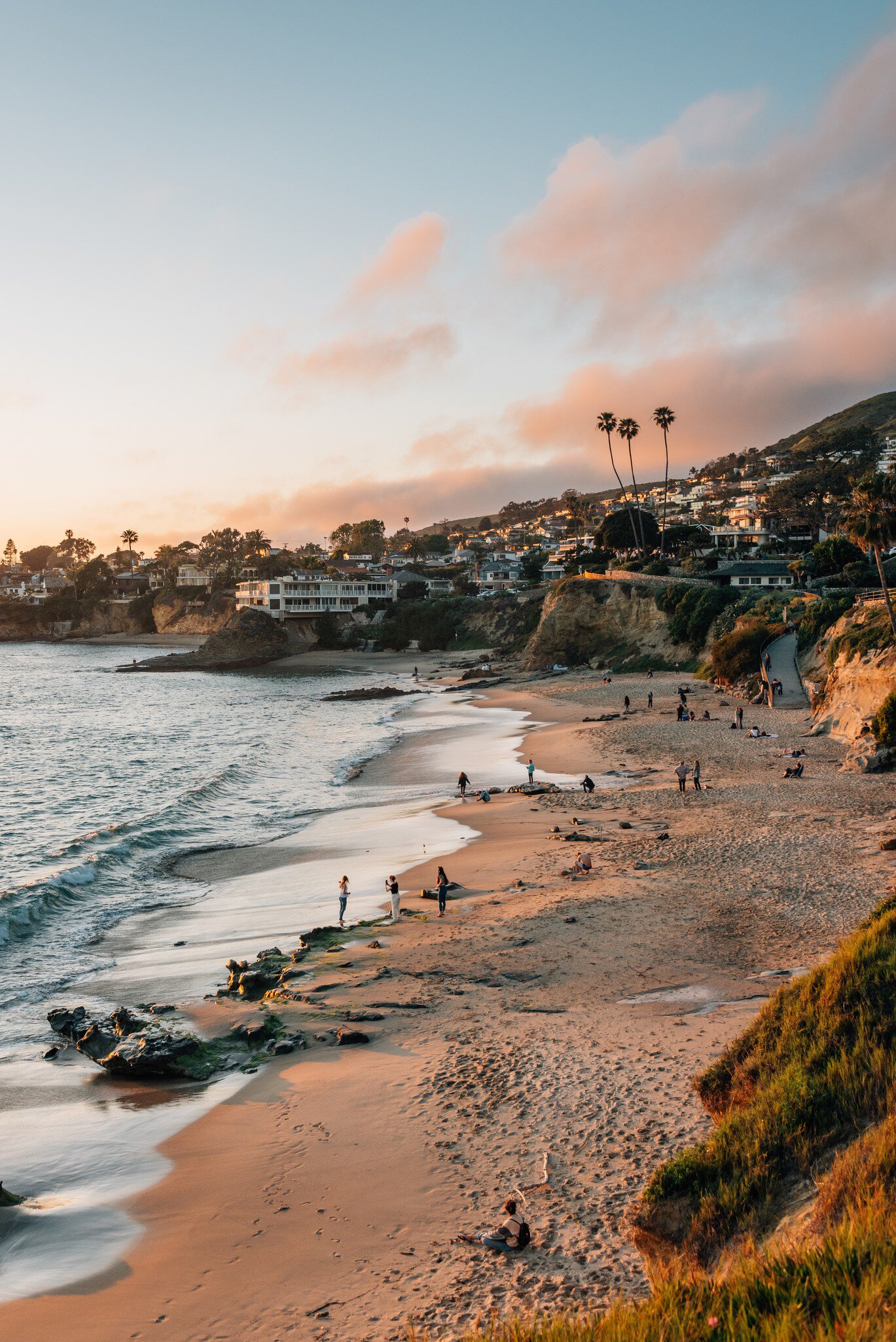 View of beach and cliffs at sunset, in Laguna Beach, Orange County, California, License Type: media, Download Time: 2025-08-04T20:29:27.000Z, User: meg3348277, Editorial: false, purchase_order: 56530 - Guidebooks, job: Global Publishing-WIP, client: Lonely Planet 'California 11, other: Megan Cassidy