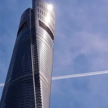 View of the gleaming Shanghai Tower on a sunny day in Shanghai, China.