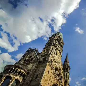 Low-angle perspective of Kaiser-Wilhelm-Gedächtniskirche Church in Berlin, Germany.