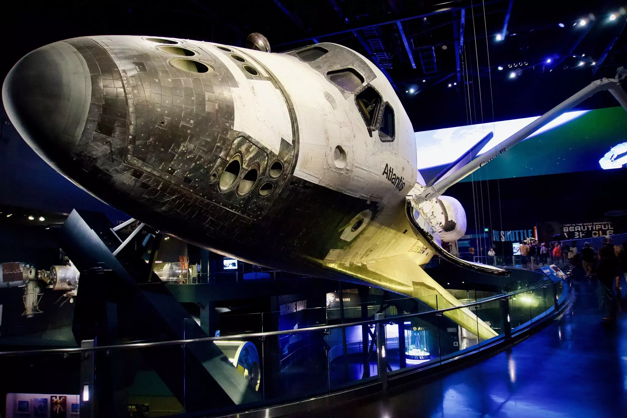 A space shuttle installed in a museum gallery.