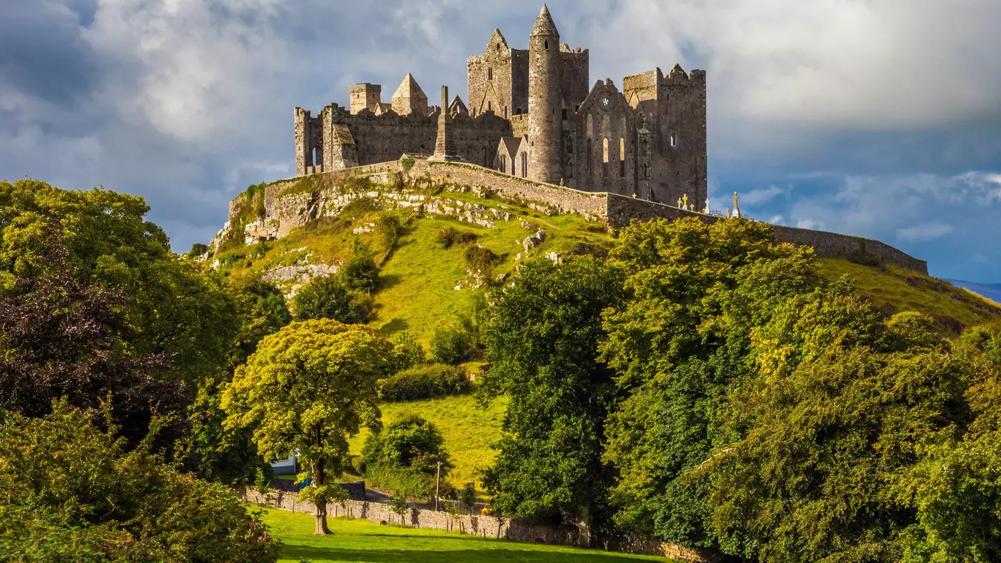 Rock of Cashel on a sunny day.
752354146
background, building, cashel, castle, cathedral, chapel, church, cloud, countryside, europe, grass, green, hill, historic, history, ireland, irish, landscape, medieval, monastery, old, place, powerful, religious, rock, rock of cashel, ruin, sheep, site, stone, tipperary, tower, travel, trees, wall, windows