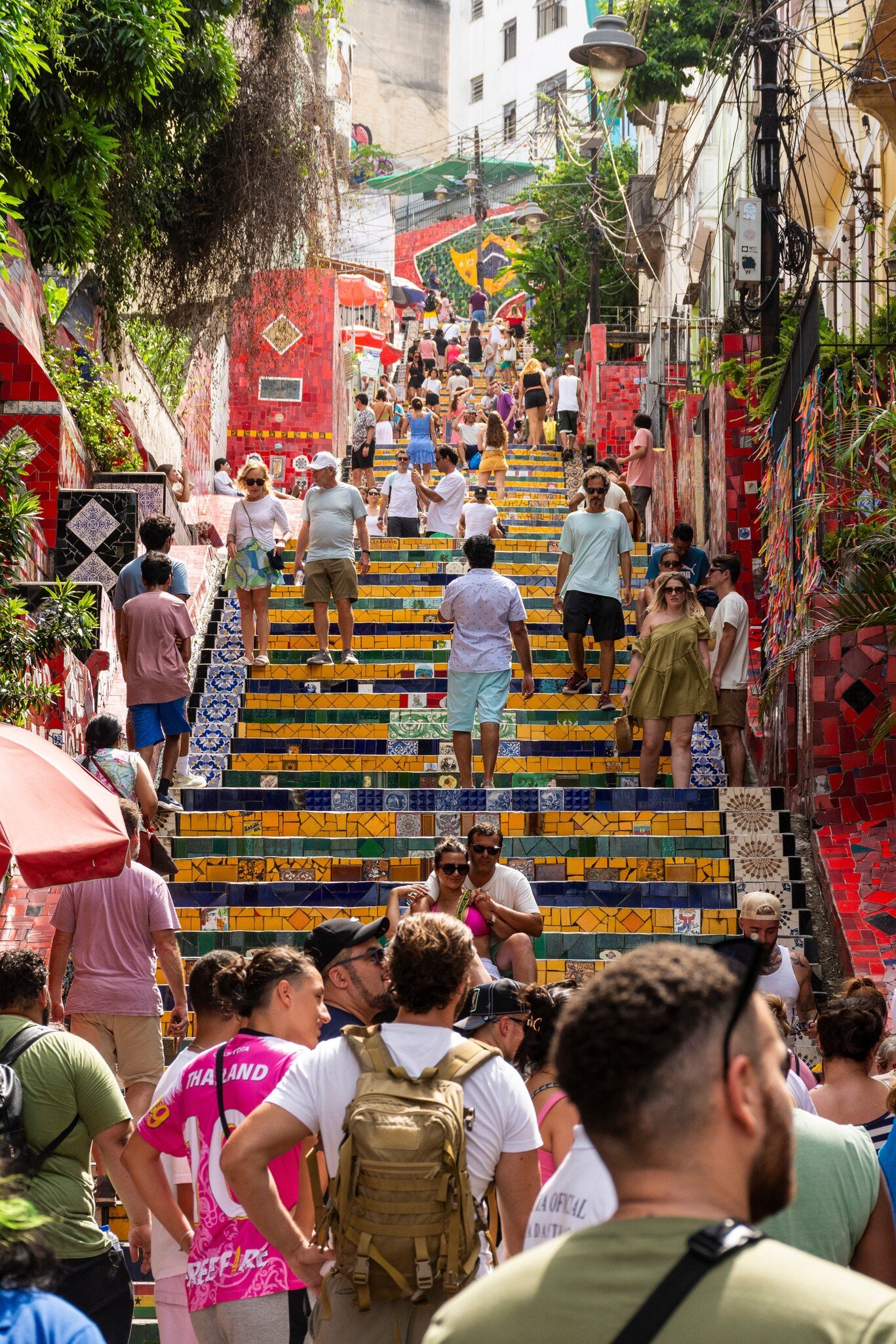 RIO DE JANEIRO, BRAZIL - FEBRUARY 5, 2024: Beautiful view to red and colorful Selaron Staircase in Lapa, License Type: media, Download Time: 2025-02-28T21:47:59.000Z, User: rhylton_redventures, Editorial: true, purchase_order: 56530 - Guidebooks, job: Lonely Planet WIP, client: Lonely Planet WIP, other: Rhianydd Hylton