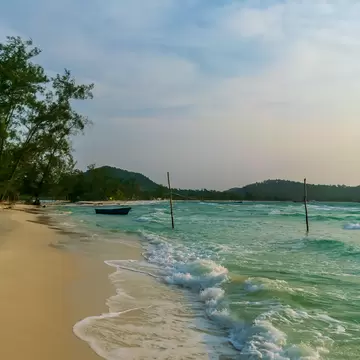 Long Set Beach, Koh Rong, Cambodia- Feb, 2020 : a view of some boats and a volleyball net on the beach at the Long Set Beach, Koh Rong, Cambodia; Shutterstock ID 1750863617;