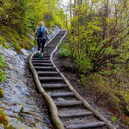Female Hiker Climbing The Alum Cave Trail on Mt. LeConte, Great Smoky Mountains National Park, Tennessee, USA