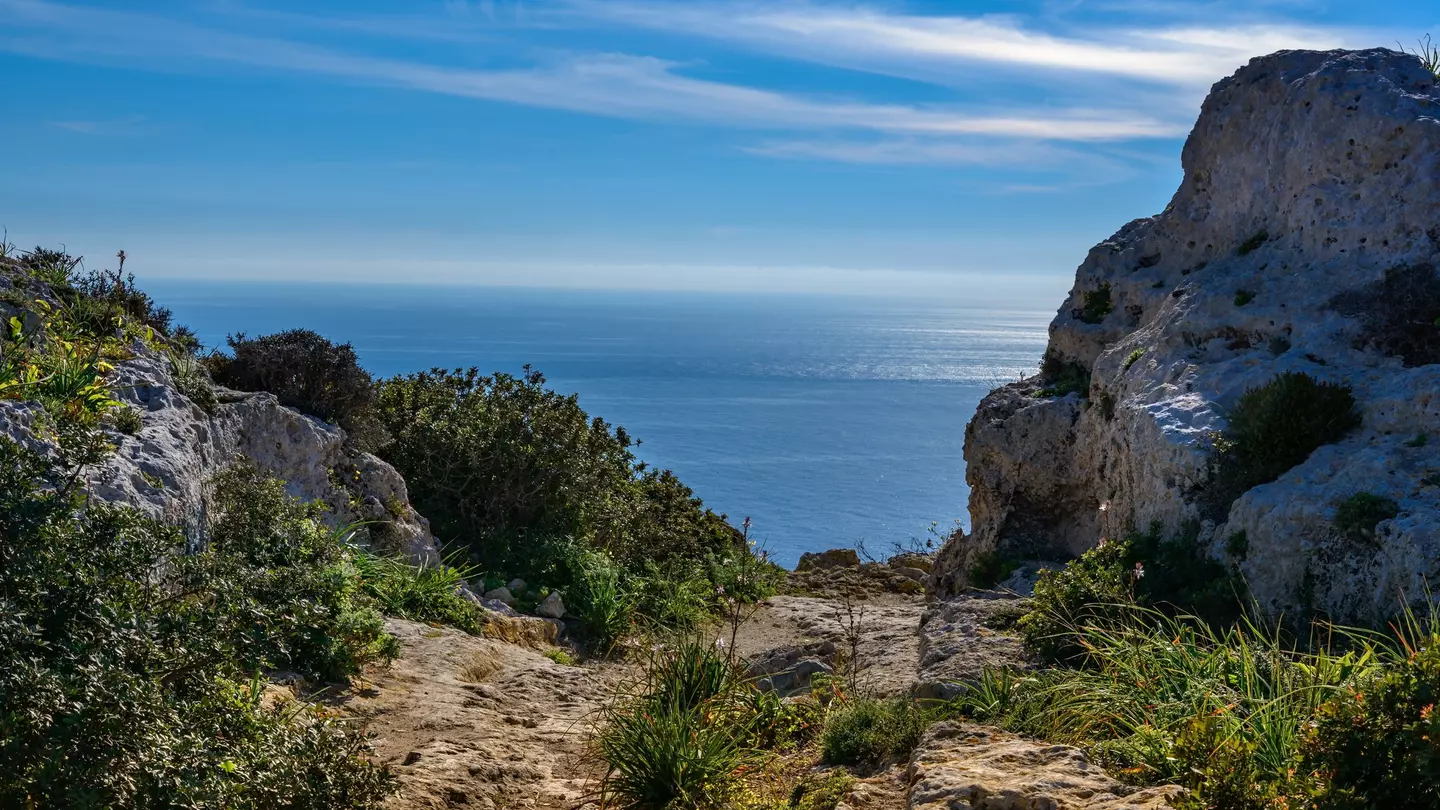 A path through the rocky landscape at Malta's Dingli Cliffs
