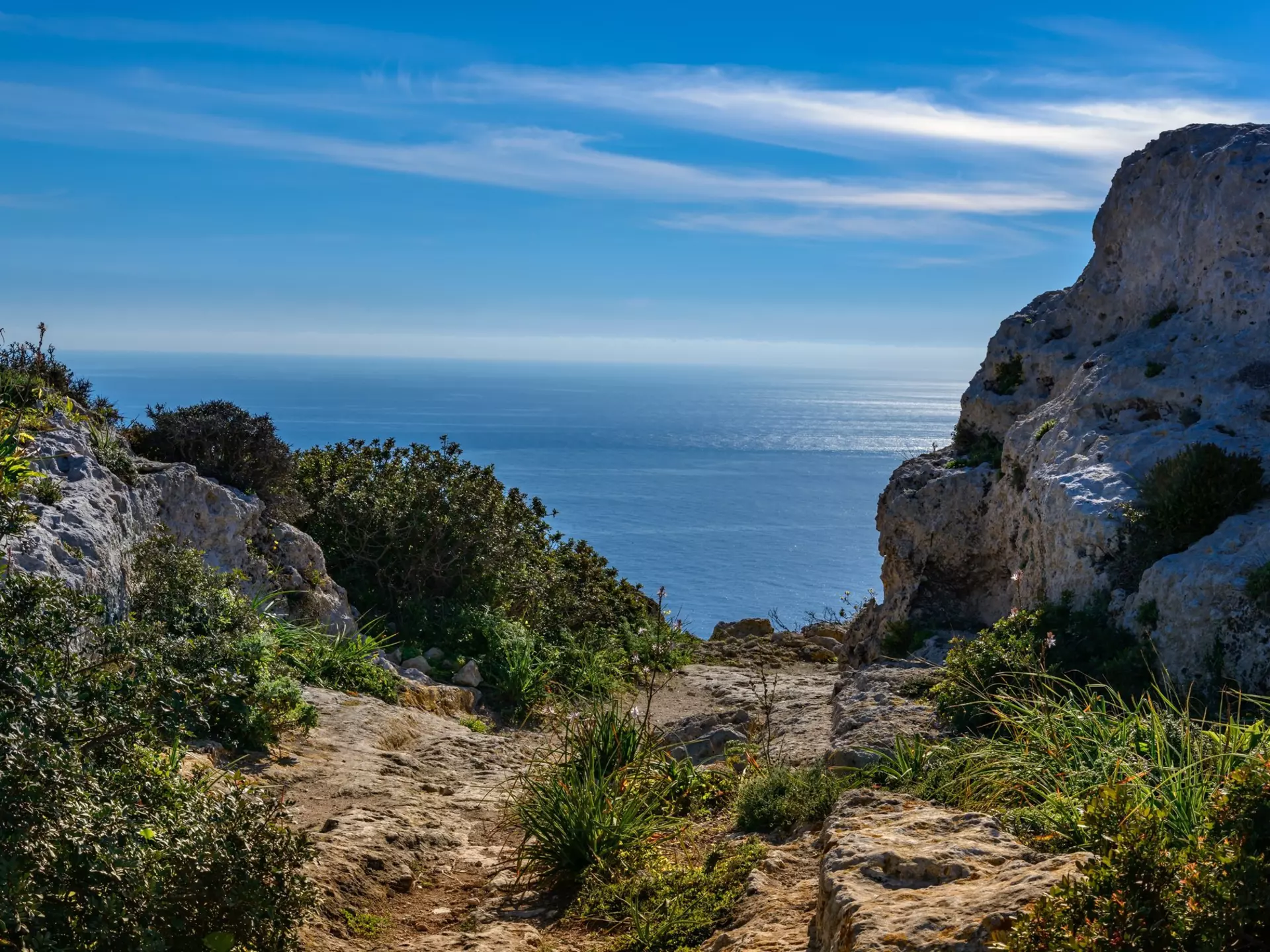 A path through the rocky landscape at Malta's Dingli Cliffs